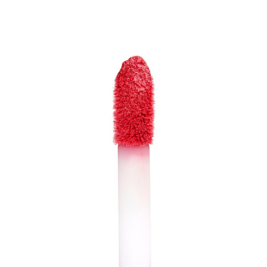 Shop TOK Beauty Lip Tonic Lip Gloss, a sheer cherry red with shimmer.